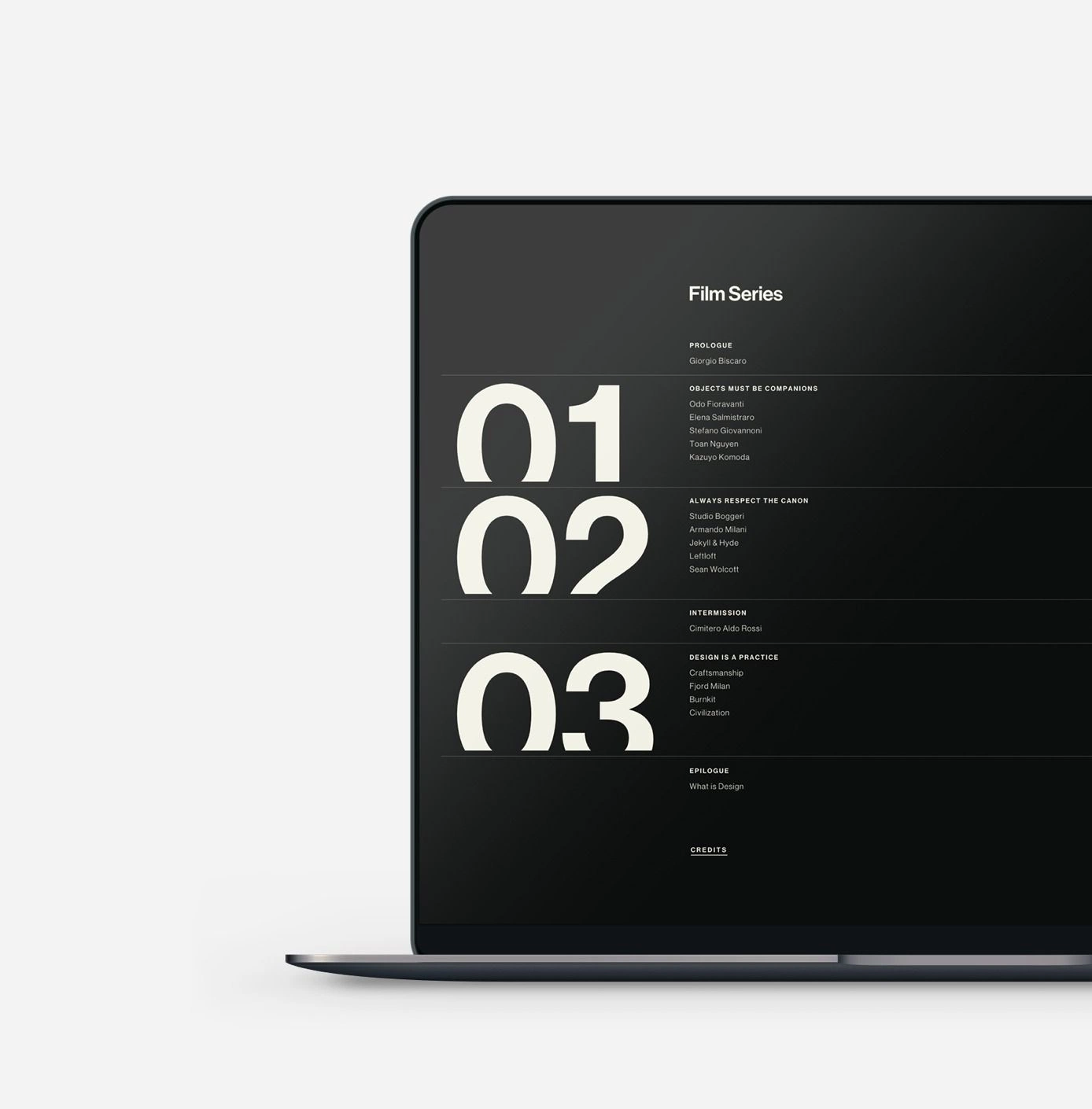 A laptop showing a dark website with a large numbered film series